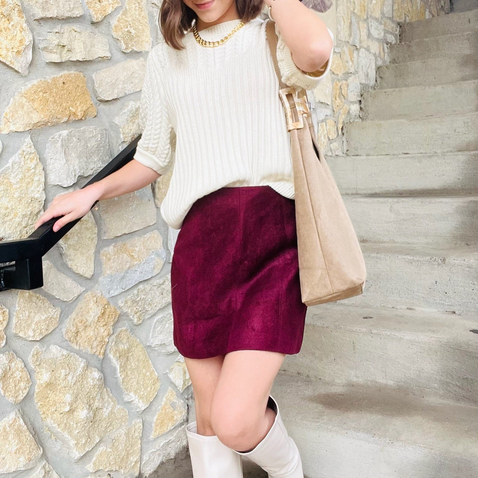 burgundy suede mini skirt, fall winter mini skirt, suede skirt for women, burgundy holiday skirt, chic suede mini, cozy fall outfit skirt, textured mini skirt, burgundy fashion staple, sleek silhouette skirt, versatile suede skirt, knee high boot outfit, winter date night outfit, polished fall look, solid burgundy skirt, back zipper mini skirt, faux suede mini skirt, trendy fall skirt, holiday outfit skirt, statement color mini skirt