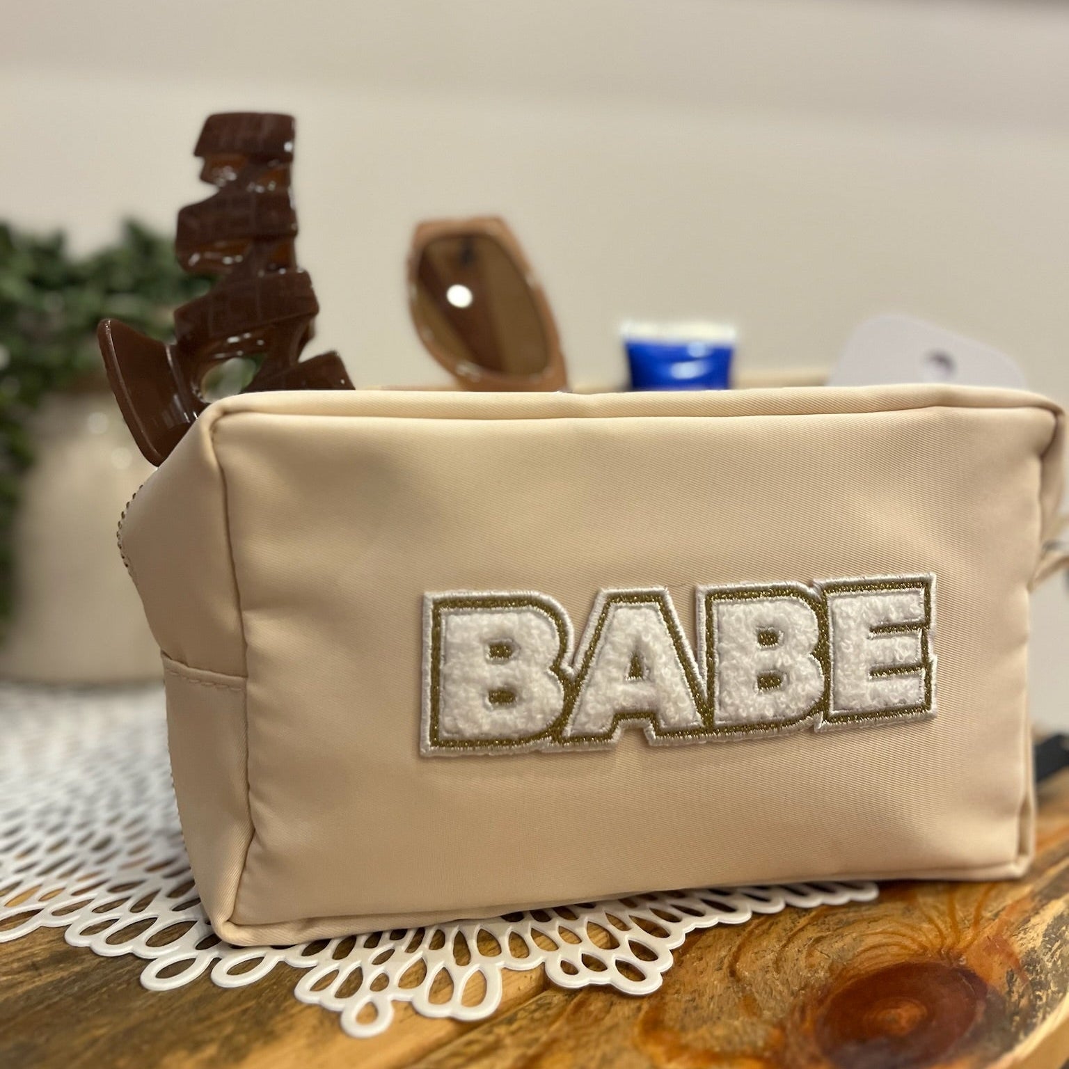 babe cosmetic bag, babe makeup bag, ivory nylon makeup pouch, travel makeup bag, cute cosmetic bag, glitter letter makeup bag, glam travel bag, toiletry pouch, nylon cosmetic case, trendy makeup organizer, babe patch letters, beauty essentials bag, gift for her, travel accessory bag, vanity storage bag, small travel pouch, stylish makeup bag, college girl gift, bridesmaid gift idea, bachelorette gift, girly travel bag, makeup lover gift, nylon toiletry bag, cute glam pouch, mini and mama matching bag