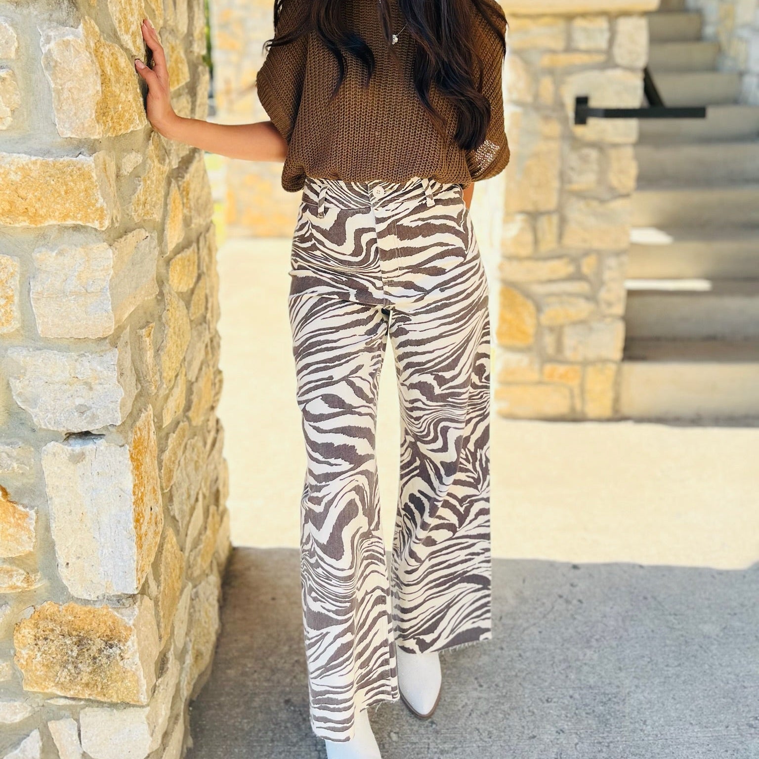 zebra print jeans, animal print denim, statement jeans, stretchy jeans, boutique denim, bold print pants, trendy zebra pants, high rise jeans, fashion forward denim, comfy statement jeans, cotton spandex jeans, printed jeans outfit, black and white jeans, stylish fall denim, boutique jeans for women, patterned jeans, chic casual outfit, statement print bottoms, trendy boutique pants