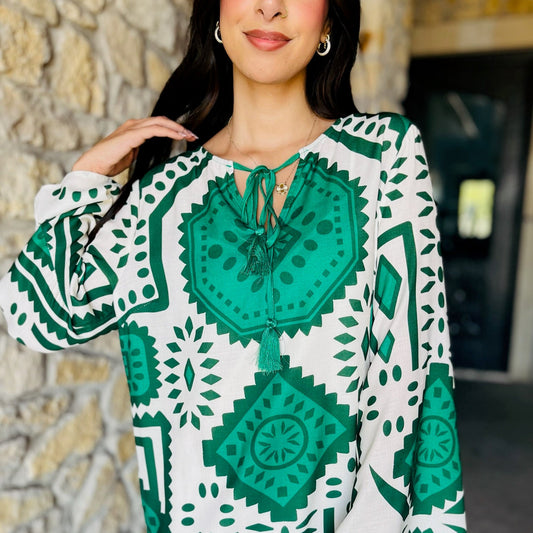 green geometric print dress, fall mini dress, long sleeve mini dress, bell sleeve dress, tassel tie dress, printed geo dress, round neck dress, fall fashion dress, woven mini dress, boho chic dress, boutique fall outfit, trendy green dress, modern print mini, lightweight fall dress, autumn outfit inspo, flowy mini dress, polyester lined dress, stylish day dress, weekend brunch dress