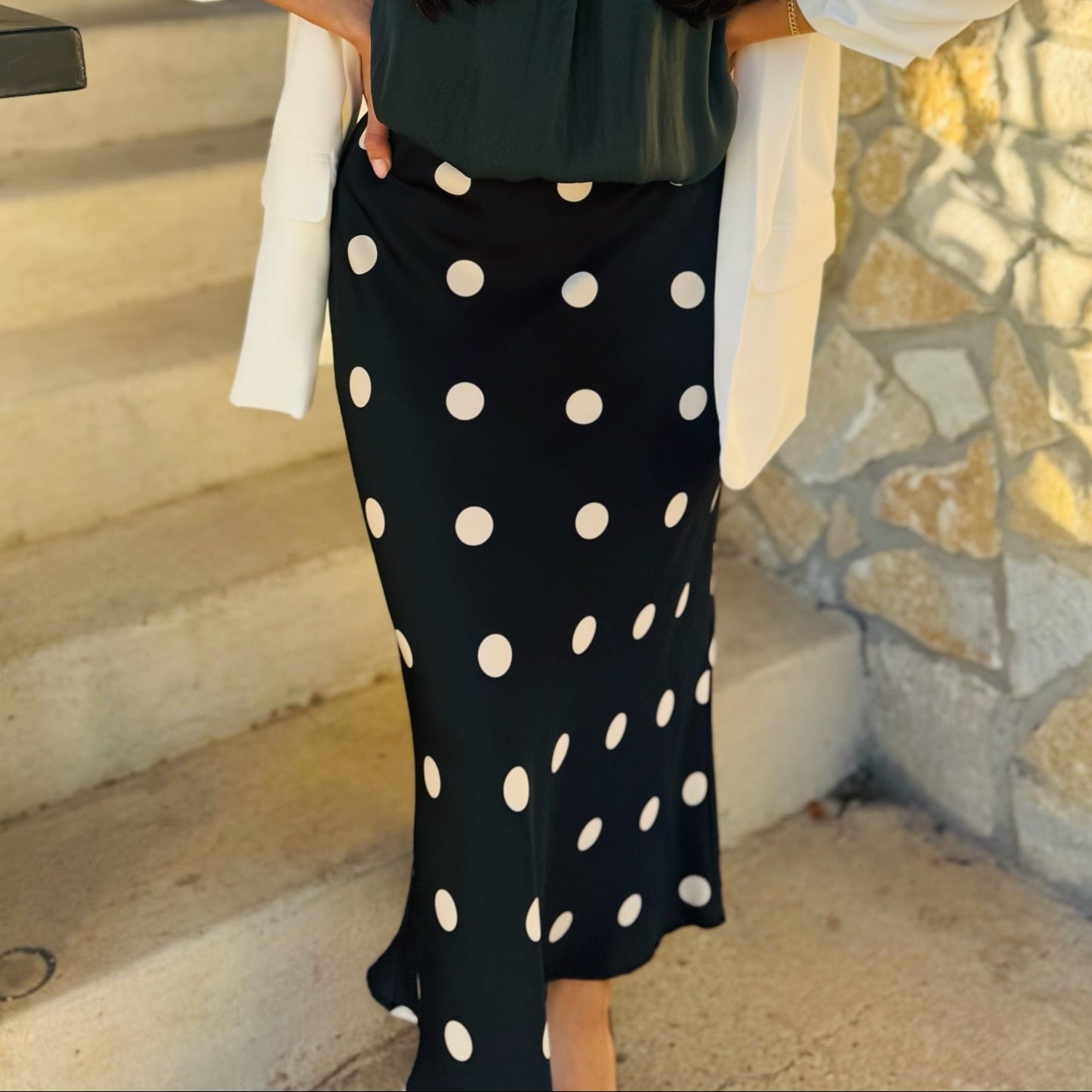 black midi skirt, polka dot midi skirt, cream polka dots, fitted midi skirt, Le Lis skirt, chic midi skirt, classic polka dot skirt, transitional wardrobe piece, fall midi skirt, winter midi skirt, versatile black skirt, workwear skirt, dinner outfit skirt, concert outfit skirt, game day skirt, elevated basics, boutique midi skirt, stretchy midi skirt, polyester spandex skirt, timeless polka dot print, neutral print skirt