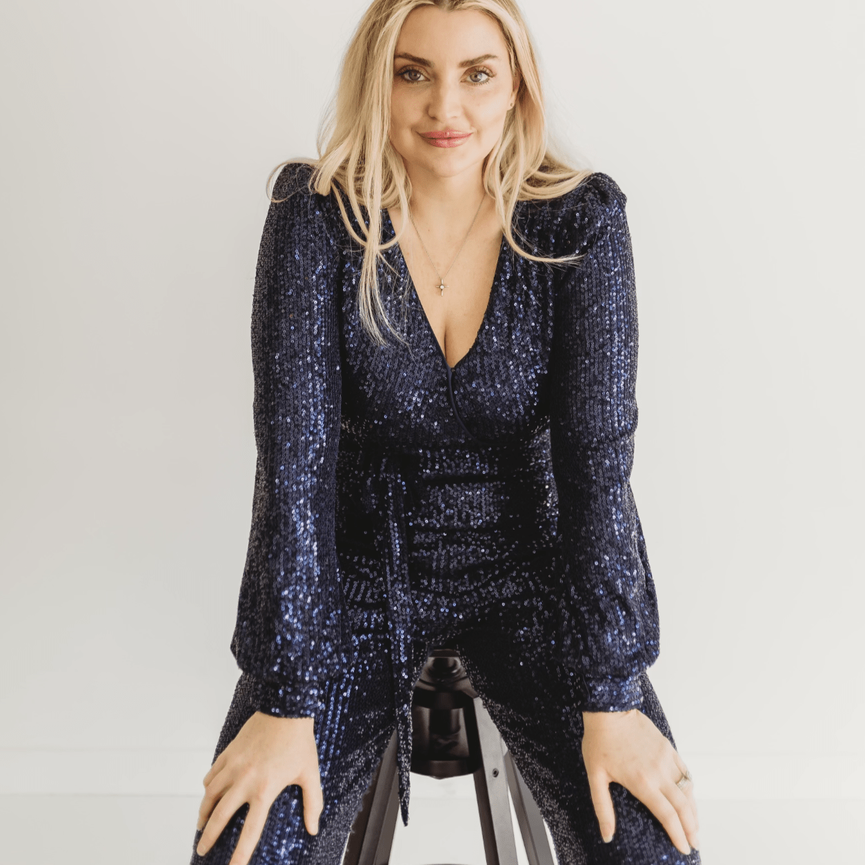 sequin jumpsuit, holiday jumpsuit, sparkly jumpsuit, long sleeve jumpsuit, v neck sequin jumpsuit, bishop sleeve jumpsuit, wrap tie waist jumpsuit, champagne sequin jumpsuit, navy sequin jumpsuit, black sequin jumpsuit, white sequin jumpsuit, party outfit, new year’s eve outfit, dressy jumpsuit, glam jumpsuit, evening wear jumpsuit, winter event outfit, statement jumpsuit, chic sequin one piece, formal jumpsuit for women