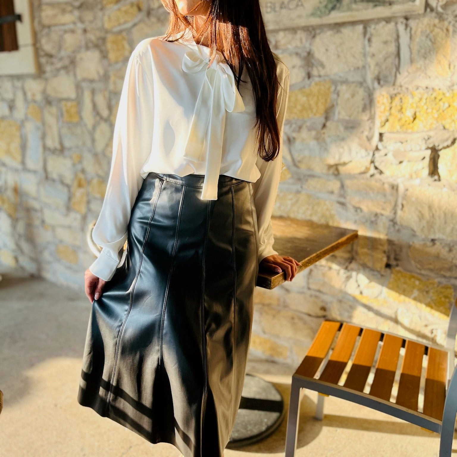 black faux leather skirt, vegan leather skirt, pleather midi skirt, flared leather skirt, black midi skirt, side zip skirt, chic black skirt, fall fashion outfit, edgy leather skirt, versatile skirt, boutique midi skirt, trendy faux leather skirt, vegan leather fashion, statement skirt, dressy black skirt, women’s midi skirt, street style outfit, fall outfit idea, night out skirt