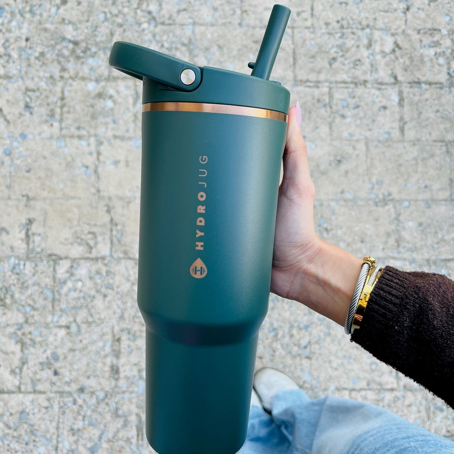 40oz water bottle, large sport water bottle, leakproof water bottle, no spill water bottle, Hydrojug bottle, carrying strap water bottle, flip straw water bottle, ergonomic water bottle, workout water bottle, gym water bottle, school water bottle, commuter water bottle, reusable water bottle, hydration bottle, colorful water bottle, patterned water bottle, durable water bottle, outdoor water bottle, fitness water bottle, everyday water bottle