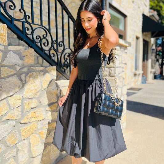 little grey dress, grey midi dress, bubble skirt dress, grey bubble midi dress, mixed media dress, knit bodice dress, spaghetti strap midi dress, sleeveless grey dress, dark grey dress, dress with side pockets, adjustable strap dress, casual to dressy dress, versatile midi dress, knit and taffeta dress, grey dress with pockets, chic grey midi dress, transitional grey dress, dress up or down, grey brunch dress, grey game day dress, modern grey dress, grey evening dress, textured skirt midi dress