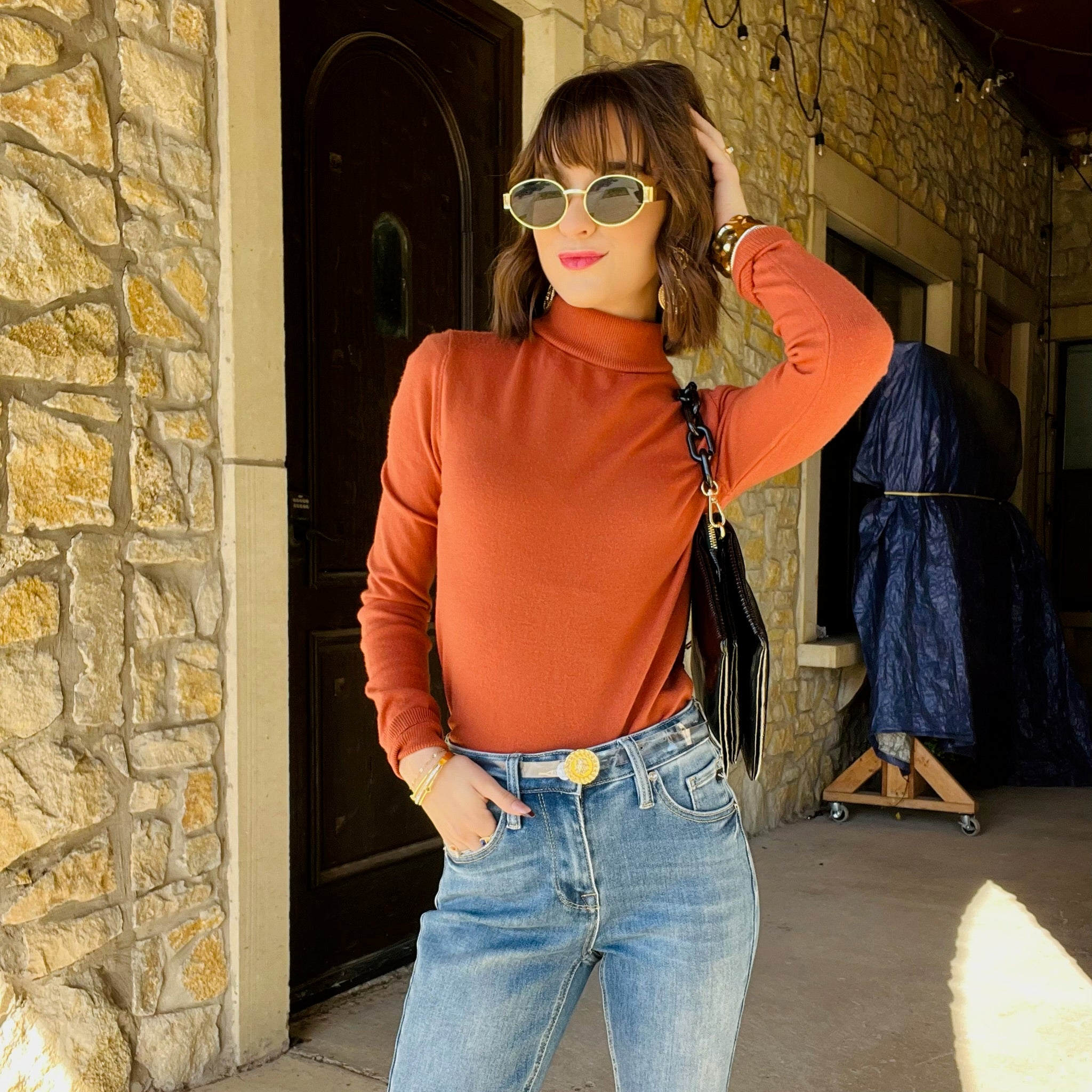 turtleneck sweater, fitted turtleneck, chic knit top, cozy fall sweater, women’s turtleneck, soft ribbed sweater, clay turtleneck, black turtleneck, classic layering piece, fall wardrobe staple, winter outfit essential, timeless knitwear, polished sweater look, casual chic top, cold weather fashion