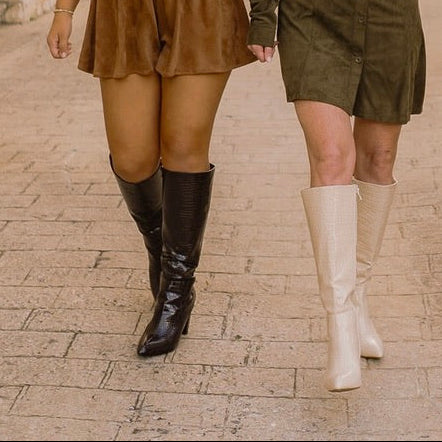 crocodile boots, patent leather boots, tall boots for women, pointed toe boots, block heel boots, beige boots, brown boots, crocodile embossed boots, sleek fall boots, winter statement boots, elegant tall boots, boutique boots for women, western inspired boots, dressy crocodile boots, chic patent boots, elongating silhouette boots, trendy knee high boots, stylish fall footwear, crocodile pattern shoes, fashion forward boots, sophisticated heeled boots, versatile day to night boots, high shine patent boots