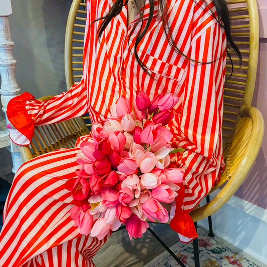 striped pajama set, red stripe pajamas, women’s pajama set, cozy lounge pajamas, long sleeve pajama set, soft pajamas women, relaxed fit pajamas, ruffle pajama set, pajama pants and top set, cute pajamas women, holiday pajamas women, matching pajamas set, sleepwear women, lounge set women, giftable pajamas, ribbon tied pajamas, pajama day outfit, boutique pajamas women, comfy sleep set, cozy stretch pajamas