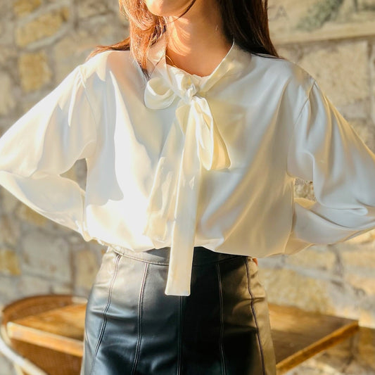 refined bow blouse, bow tie blouse, sophisticated blouse, chic blouse, elegant women's top, black blouse, white blouse, button down blouse, long sleeve blouse, office blouse, workwear top, dressy blouse, evening blouse, woven blouse, polished blouse, classic blouse, feminine blouse, versatile blouse, timeless blouse, professional top, business casual top, dinner outfit blouse, sleek blouse, wardrobe essential top