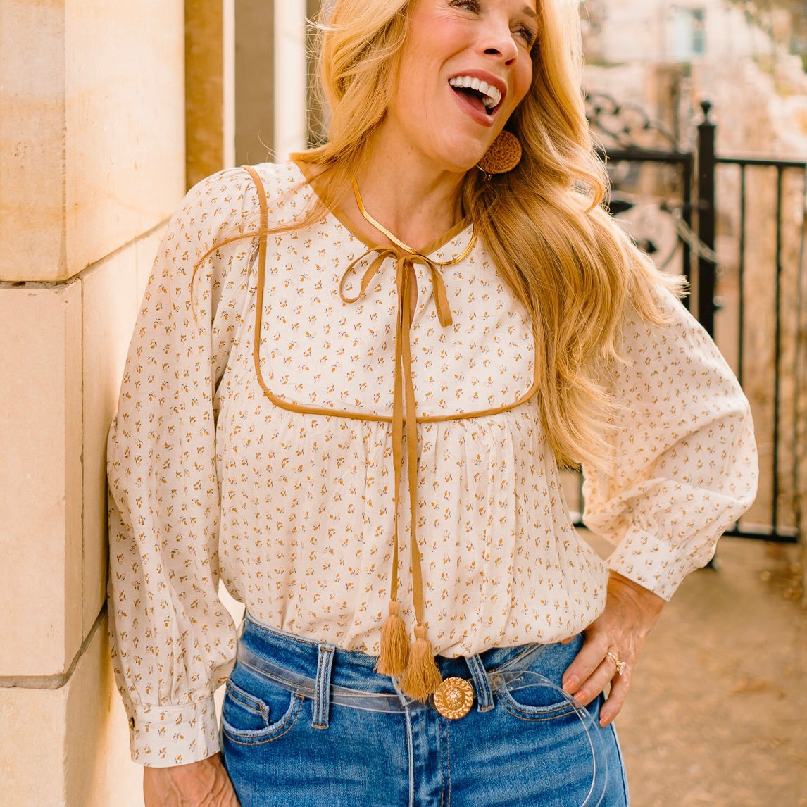 ditsy print blouse, boho floral blouse, linen long sleeve top, tassel tie blouse, feminine boho blouse, boutique fall top, gold trim blouse, lightweight printed blouse, bohemian chic shirt, casual floral top, girly fall outfit, boutique blouse for women, floral peasant top, boho fall fashion, soft linen blouse, fall wardrobe staple, relaxed fit blouse, romantic boho style, everyday floral blouse, country chic outfit, trendy boutique top, versatile fall blouse, tassel neckline blouse, boho-inspired