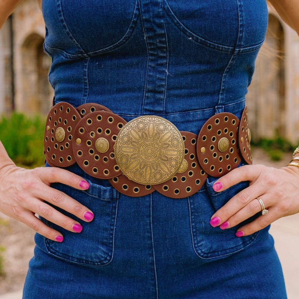 western belt, boho chic belt, round panel belt, eyelet detail belt, oversized belt, antique gold belt, black faux leather belt, brown faux leather belt, western boho accessory, statement belt, trendy boho belt, cowboy chic belt, rodeo fashion belt, country western belt, festival outfit belt, denim belt accessory, flowy skirt belt, bohemian style belt, gold hardware belt, versatile fashion belt