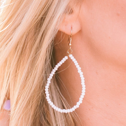 teardrop earrings, beaded teardrop earrings, beaded earrings, lightweight earrings, spring earrings, summer earrings, simple earrings, statement piece earrings, essential earrings, teardrop beaded earrings, white earrings
