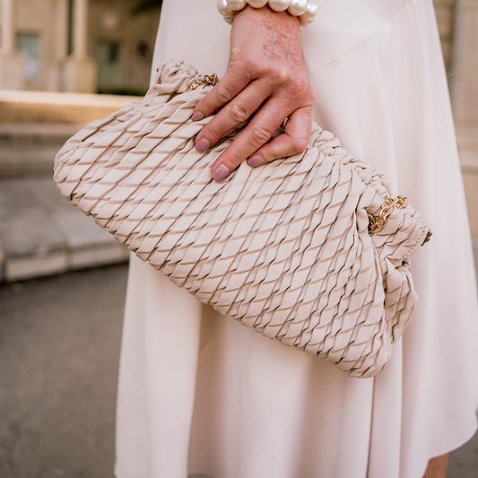 ruched satchel bag, vegan leather purse, chic handbag, boutique handbags, chain strap bag, structured satchel, trendy fall bag, beige satchel, black satchel, ruched vegan leather bag, hinge closure purse, elegant handbags for women, two compartment purse, everyday chic bag, stylish work bag, fashion satchel for women, boutique accessories, soft pleated handbag, modern vegan leather satchel, trendy shoulder bag, organized purse, cruelty free handbag, versatile day to night bag