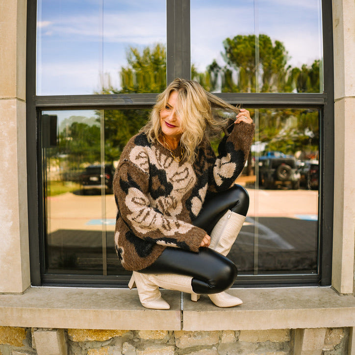 floral fall sweater, cozy fuzzy sweater, floral jacquard knit, warm tone sweater, drop shoulder sweater, round neck fuzzy pullover, ribbed hem sweater, soft floral knit top, cozy fall outfit, long sleeve floral sweater, decorative stitching sweater, textured knit pullover, autumn floral sweater, chic cold weather sweater, fuzzy floral top, comfy fall knitwear, statement floral sweater, casual cozy fall style, feminine fall sweater, soft wool blend sweater