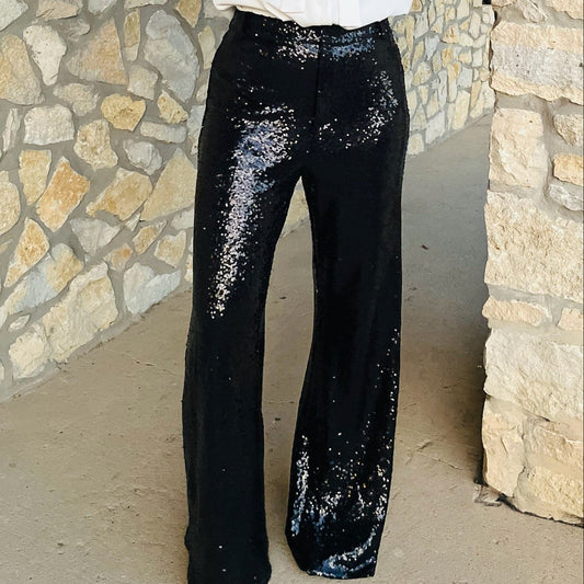 black sequin pants, sequin wide leg pants, full sequin trousers, black sparkle pants, holiday sequin pants, evening wear pants, party outfit pants, glam statement pants, high shine pants, zipper front sequin pants, lined sequin pants, dressy black pants, new year’s eve outfit, women’s sequin bottoms, wide fit sequin trousers, formal sparkle pants, winter event outfit, chic sequin look, bold holiday fashion