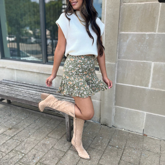 olive floral skort, high waisted skort, mini skort, built-in shorts skirt, floral print skort, women’s summer skort, boutique skort, flirty mini skirt, vacation outfit skort, casual chic skort, layered skort, lined skort, versatile skort for women, warm weather skirt, dinner outfit skort, family photo outfit, trendy summer skirt, feminine skirt with shorts, easy-to-wear skort, olive green skort, stylish summer bottom, lightweight skort, flirty floral skort, effortless summer style