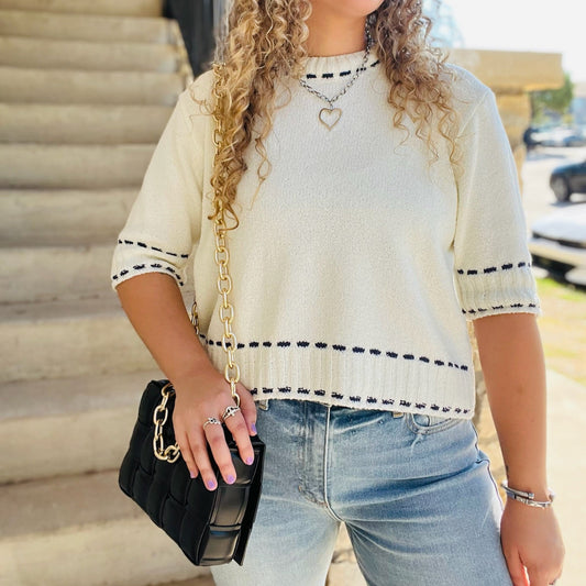 stitch detail top, knit short sleeve top, white and navy top, textured knit blouse, crew neck knit top, classic short sleeve sweater, casual chic top, office knit top, brunch outfit top, everyday knit blouse, lightweight sweater top, navy trim top, polished casual top, versatile white top, feminine knit shirt, stylish textured top, soft acrylic knit top, minimal knit blouse, timeless short sleeve top, effortless everyday top