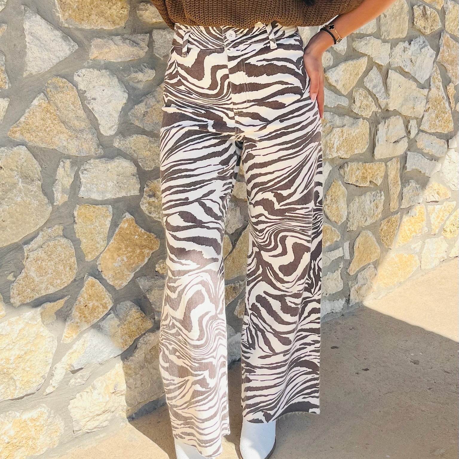 zebra print jeans, animal print denim, statement jeans, stretchy jeans, boutique denim, bold print pants, trendy zebra pants, high rise jeans, fashion forward denim, comfy statement jeans, cotton spandex jeans, printed jeans outfit, black and white jeans, stylish fall denim, boutique jeans for women, patterned jeans, chic casual outfit, statement print bottoms, trendy boutique pants