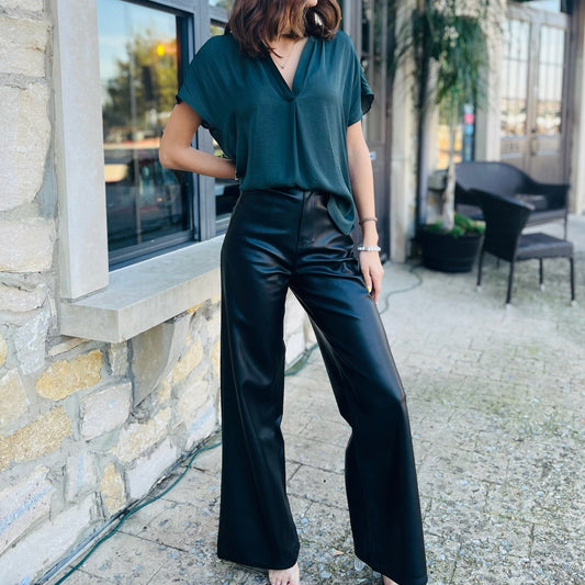 leather pants, vegan leather pants, wide leg pants, black leather pants, zip-fly pants, chic pants, on-trend pants, flattering pants, wardrobe essential, versatile pants, front pockets, back pockets, women's fashion, night out outfit, elevated style, timeless pants, winter style, winter outfits, going out pants, NYE, new years outfit, christmas pants, christmas outfit, winter staples