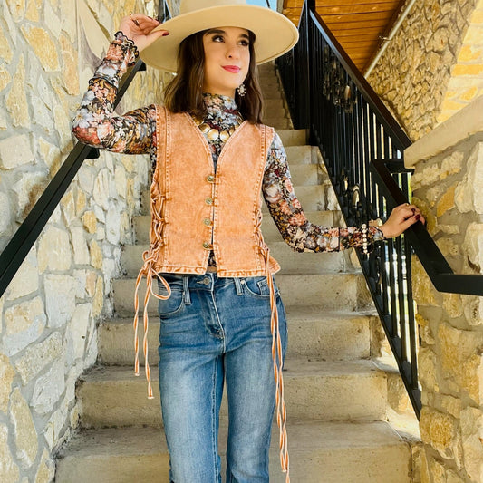 denim vest, lace up denim vest, boho denim vest, western denim vest, sleeveless denim top, v-neck denim vest, button up vest, festival denim vest, concert outfit vest, rodeo outfit vest, denim vest for layering, rust denim vest, tan denim vest, solid color vest, cowgirl style vest, lace up side vest, denim statement piece, summer to fall vest, country concert outfit, boho western outfit, denim vest top, sleeveless western top, trendy denim vest, western chic vest