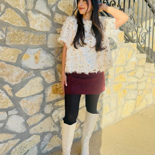 burgundy suede mini skirt, fall winter mini skirt, suede skirt for women, burgundy holiday skirt, chic suede mini, cozy fall outfit skirt, textured mini skirt, burgundy fashion staple, sleek silhouette skirt, versatile suede skirt, knee high boot outfit, winter date night outfit, polished fall look, solid burgundy skirt, back zipper mini skirt, faux suede mini skirt, trendy fall skirt, holiday outfit skirt, statement color mini skirt