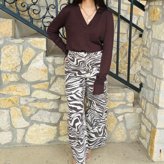 zebra print jeans, animal print denim, statement jeans, stretchy jeans, boutique denim, bold print pants, trendy zebra pants, high rise jeans, fashion forward denim, comfy statement jeans, cotton spandex jeans, printed jeans outfit, black and white jeans, stylish fall denim, boutique jeans for women, patterned jeans, chic casual outfit, statement print bottoms, trendy boutique pants