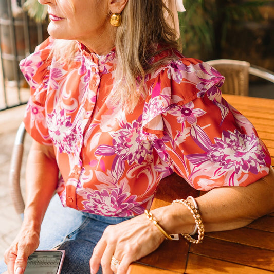 ruffle print top, multicolor blouse, feminine printed top, high neck blouse, button down ruffle top, woven short sleeve top, colorful patterned blouse, timeless printed blouse, chic ruffle sleeve top, classic feminine top, vibrant print blouse, summer to fall top, dressy casual blouse, statement print top, lightweight woven blouse, stylish multicolor top, trendy ruffle blouse, polished printed top, playful pattern blouse, versatile dressy top