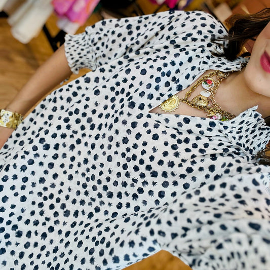 dot print blouse, jacquard dot top, puff sleeve blouse, smocked neckline top, lightweight women's blouse, business casual top, office outfit blouse, chic everyday top, V-neck blouse, feminine blouse for work, weekend brunch top, boutique women's top, casual yet polished top, versatile blouse for women, stylish dot print top, trendy puff sleeve top, smocked cuff blouse, sophisticated workwear top, soft breathable blouse, timeless women’s top, elegant dot blouse, neutral printed blouse, office to weekend top,
