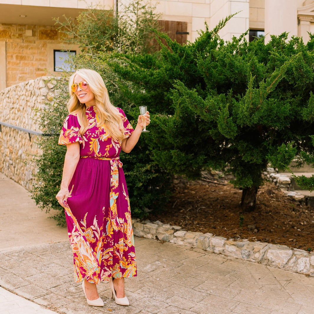 printed midi dress, colorful patterned dress, self-tie waist dress, pleated midi dress, ruffled edge dress, short sleeve midi dress, high neck dress, elegant printed dress, boutique women’s dress, summer wedding dress, brunch outfit dress, garden party dress, vibrant print dress, flattering midi dress, versatile women’s dress, chic day to night dress, statement midi dress, feminine silhouette dress, patterned summer dress, trendy midi dress, stylish printed dress, polished outfit dress, boutique fashion dre