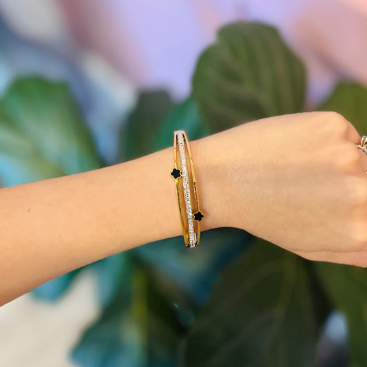 gold bracelet cuff, rhinestone bracelet, flower cuff bracelet, clover detail bracelet, gold plated bracelet, stainless steel jewelry, cubic zirconia bracelet, sparkly bracelet, girly bracelet, trendy gold cuff, everyday jewelry, boutique bracelet, stacking bracelet, dainty cuff bracelet, floral detail bracelet, chic gold accessory, crystal bracelet, fashion jewelry, women’s cuff bracelet, clover bracelet, clover