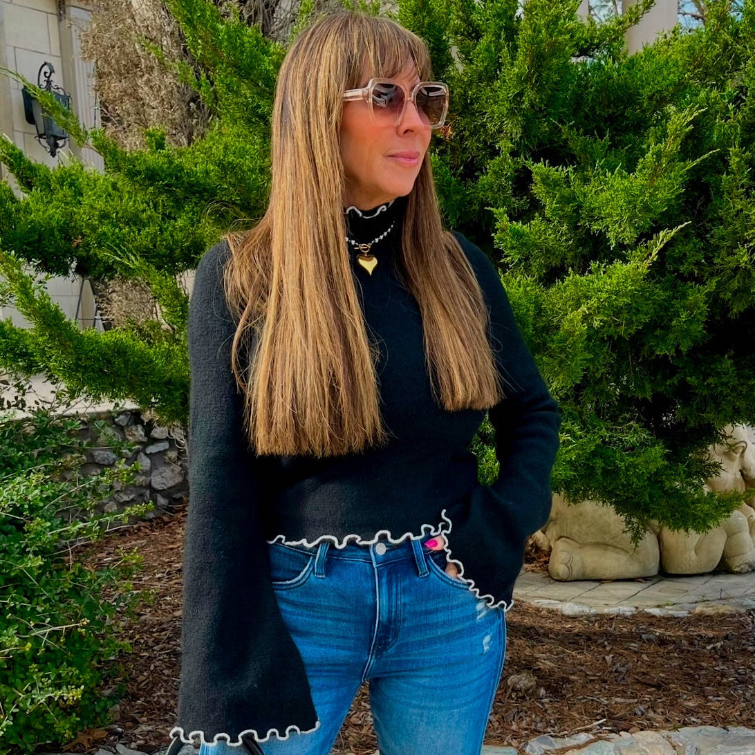 contrast turtleneck sweater, mock neck sweater, contrast stitch sweater, flare sleeve sweater, slim fit knit top, trendy fall sweater, cozy knit mock neck, boutique fall fashion, chic neutral sweater, stylish knit top, elevated basic sweater, modern classic knit, color contrast pullover, women’s fall style, polished fall outfit, sweater with flare sleeves, fall layering top, contrast detail knit, fall wardrobe staple, office to weekend sweater, cozy chic top, minimalist sweater, black and white sweater