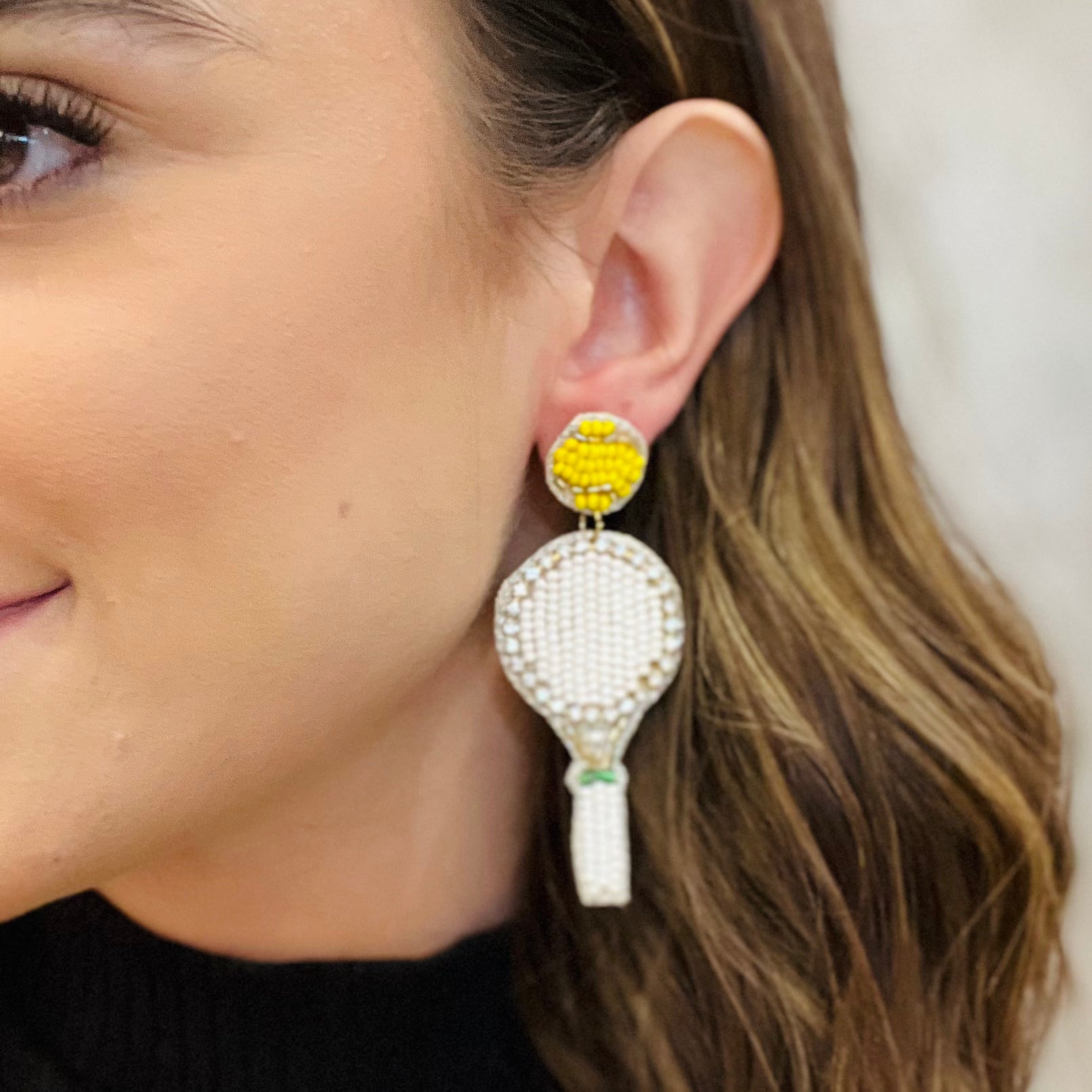 sports earrings, tennis racket earrings, pickleball paddle earrings, rhinestone earrings, seed bead earrings, sporty chic jewelry, game day earrings, sports fan accessories, athlete gift ideas, tennis jewelry, pickleball jewelry, lightweight statement earrings, fun sports earrings, multicolor earrings, court style accessories, sporty glam earrings, felt back earrings, trendy sports fashion, unique gift for athletes, sparkle earrings