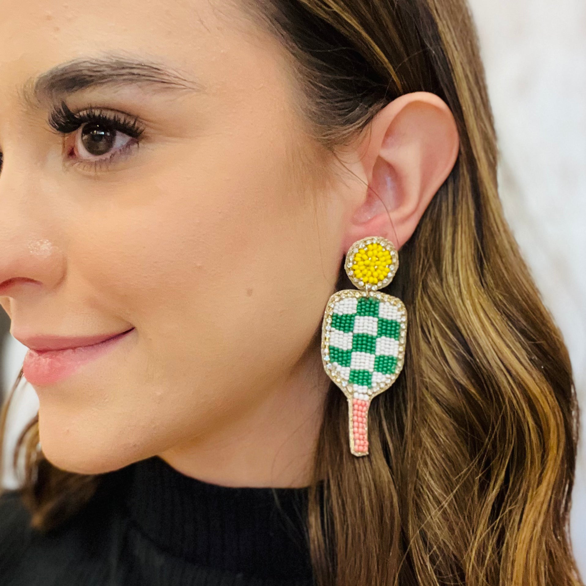 sports earrings, tennis racket earrings, pickleball paddle earrings, rhinestone earrings, seed bead earrings, sporty chic jewelry, game day earrings, sports fan accessories, athlete gift ideas, tennis jewelry, pickleball jewelry, lightweight statement earrings, fun sports earrings, multicolor earrings, court style accessories, sporty glam earrings, felt back earrings, trendy sports fashion, unique gift for athletes, sparkle earrings