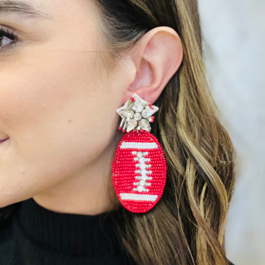 beaded football earrings, oversized football earrings, game day earrings, tailgate earrings, football fan jewelry, sparkly football earrings, seed bead earrings, rhinestone football earrings, red football earrings, orange football earrings, navy football earrings, school spirit earrings, team color earrings, medium weight earrings, statement football earrings, stadium accessory earrings, cheer earrings, sideline jewelry, game day accessories, sports fan earrings