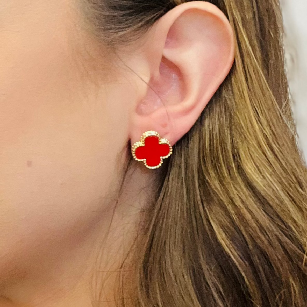 clover stud earrings, designer inspired earrings, enamel clover studs, gold detailed earrings, black clover earrings, red clover earrings, timeless stud earrings, elegant everyday jewelry, minimalist earrings, classic gold studs, lightweight earrings, chic clover jewelry, stainless steel earrings, fashion stud earrings, statement studs, trendy gold earrings, versatile everyday studs, clover jewelry set, matching clover necklace, non hypoallergenic earrings