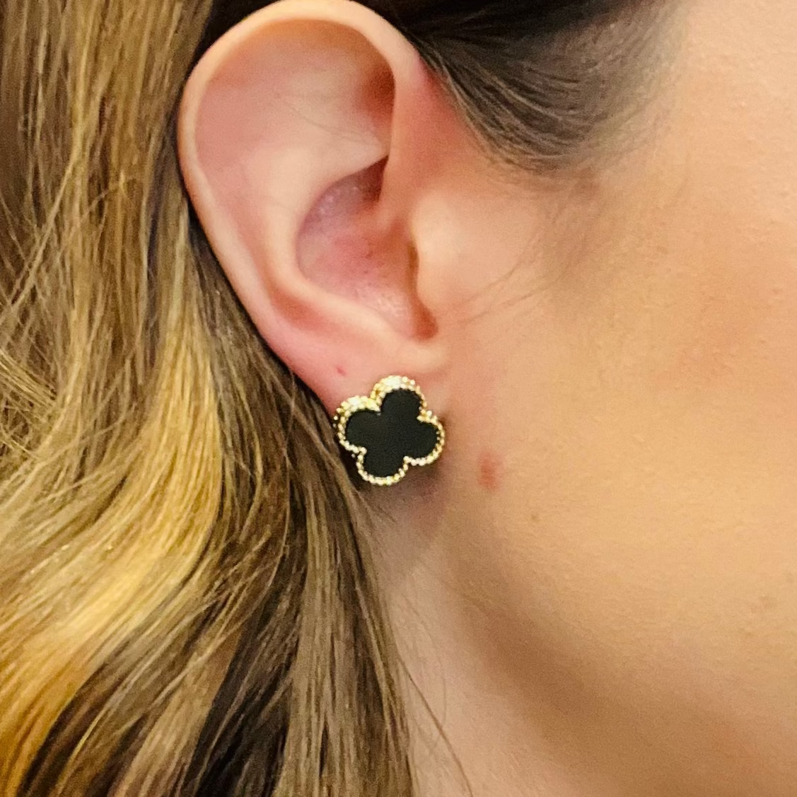 clover stud earrings, designer inspired earrings, enamel clover studs, gold detailed earrings, black clover earrings, red clover earrings, timeless stud earrings, elegant everyday jewelry, minimalist earrings, classic gold studs, lightweight earrings, chic clover jewelry, stainless steel earrings, fashion stud earrings, statement studs, trendy gold earrings, versatile everyday studs, clover jewelry set, matching clover necklace, non hypoallergenic earrings