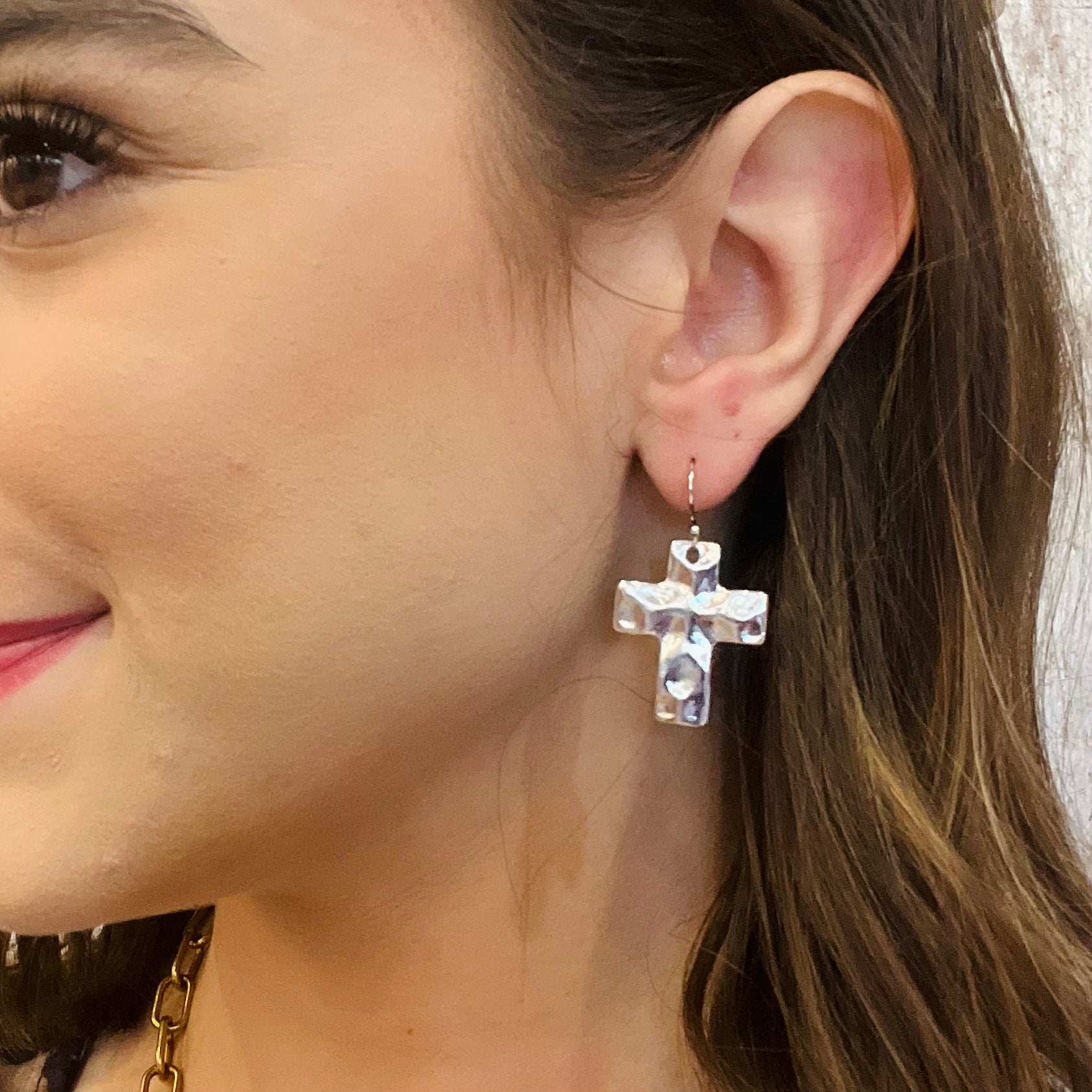 hammered cross earrings, faith inspired jewelry, gold cross earrings, silver cross earrings, textured cross design, lightweight drop earrings, french wire dangle, religious jewelry gift, symbolic cross pendant, modern faith accessory, timeless cross earrings, non hypoallergenic earrings, not water resistant jewelry, gold silver metal hardware, everyday faith earrings, minimalist religious earrings, dainty cross drops, spiritual jewelry, classic cross statement, elegant faith inspired style