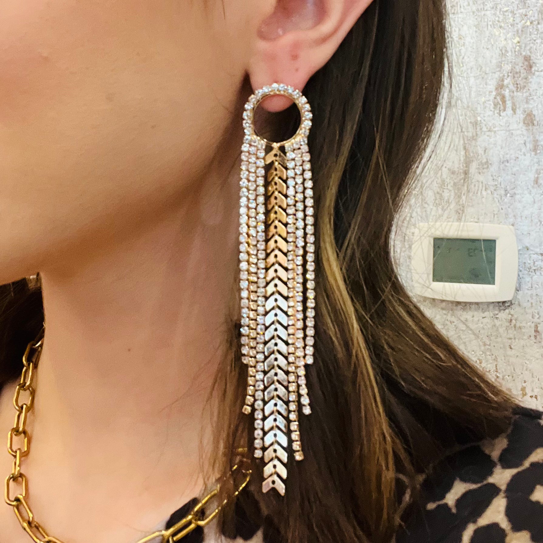 boho tassel earrings, bohemian statement earrings, mixed metal earrings, rhinestone fringe earrings, chain tassel earrings, festival jewelry, concert style accessories, boho glam earrings, long tassel statement earrings, eclectic jewelry, bold bohemian style, gold and silver mixed metal earrings, lightweight statement earrings, unique chain detail earrings, rhinestone embellished earrings, free-spirited fashion jewelry, trendy festival earrings, boho chic accessories, dramatic tassel earrings, western boho 