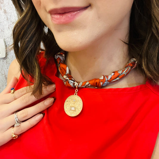 scarf necklace, orange scarf necklace, multicolor scarf necklace, rhinestone pendant necklace, hammered pendant necklace, trendy necklace, statement necklace, gold jewelry set, scarf jewelry, satin scarf necklace, water resistant necklace, fall accessories, fashion jewelry, gold stud earrings, modern chic necklace, women’s trendy jewelry, bold accessories, elegant jewelry set, scarf choker necklace, boho chic necklace