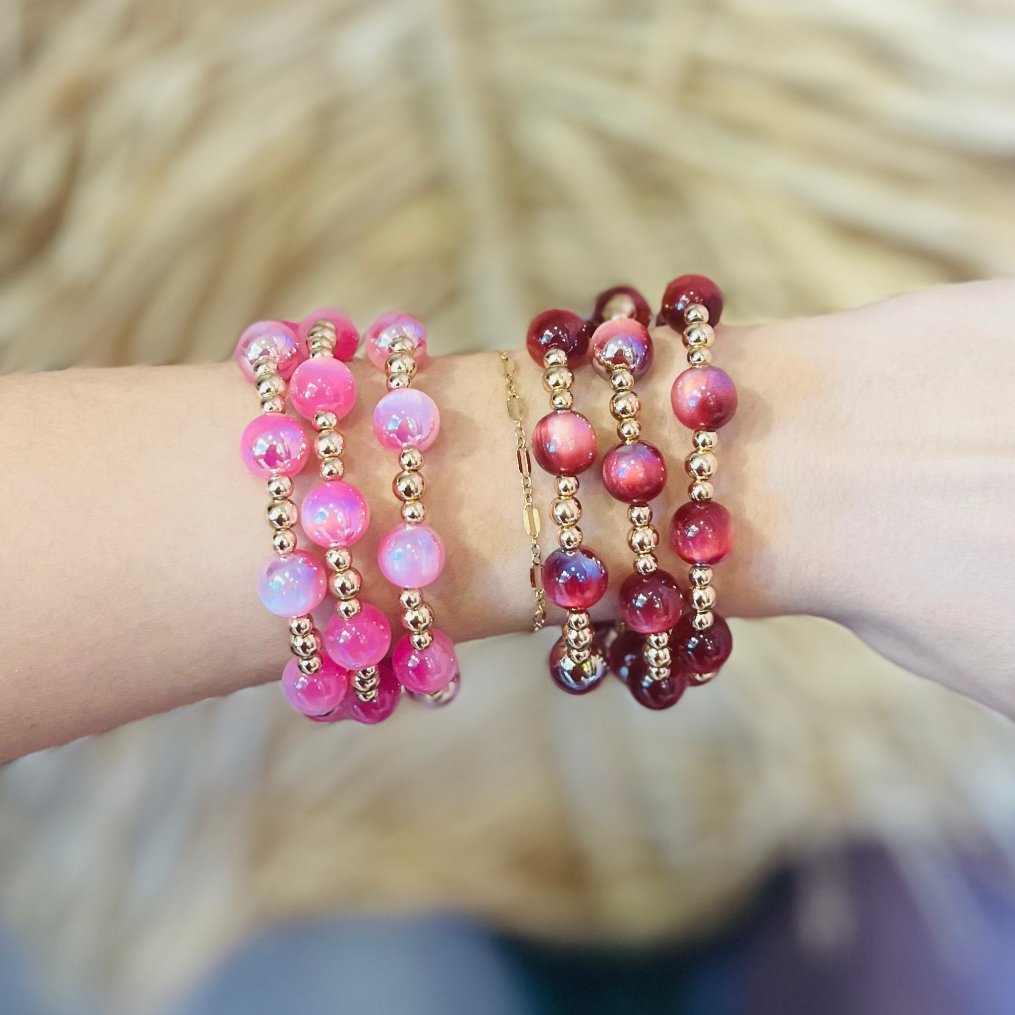 glass bead bracelets, iridescent bracelets, gold bead bracelet set, red bracelet set, pink bracelet set, beaded jewelry, stacking bracelets, mix and match bracelets, lightweight bracelets, boho chic jewelry, everyday bracelet set, glam accessories, bracelet stack, colorful beaded bracelets, gold hardware jewelry, trendy bracelet set, versatile bracelet set, statement bracelets, dainty bead bracelets, gift for her