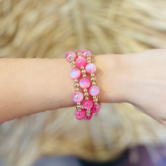 glass bead bracelets, iridescent bracelets, gold bead bracelet set, red bracelet set, pink bracelet set, beaded jewelry, stacking bracelets, mix and match bracelets, lightweight bracelets, boho chic jewelry, everyday bracelet set, glam accessories, bracelet stack, colorful beaded bracelets, gold hardware jewelry, trendy bracelet set, versatile bracelet set, statement bracelets, dainty bead bracelets, gift for her