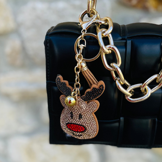 christmas bag charm, holiday purse charm, candy cane charm, reindeer charm, rhinestone bag charm, festive keychain, tassel bag accessory, gold hardware charm, christmas gift idea, stocking stuffer, holiday accessory, christmas rhinestone charm, multicolor bag charm, festive purse accessory, reindeer keychain, candy cane keychain, christmas fashion accessory, cute holiday charm, christmas tote charm, christmas backpack charm