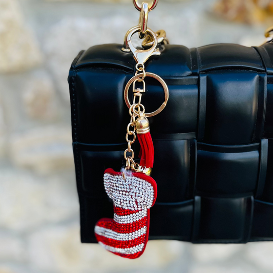 christmas bag charm, holiday purse charm, candy cane charm, reindeer charm, rhinestone bag charm, festive keychain, tassel bag accessory, gold hardware charm, christmas gift idea, stocking stuffer, holiday accessory, christmas rhinestone charm, multicolor bag charm, festive purse accessory, reindeer keychain, candy cane keychain, christmas fashion accessory, cute holiday charm, christmas tote charm, christmas backpack charm
