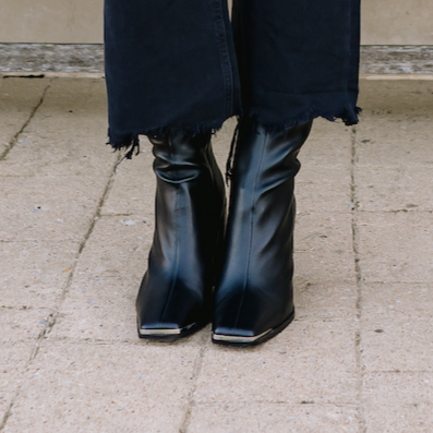 faux leather booties, booties, fall booties, winter booties, boots, fall boots, winter boots, mid calf booties, mid calf boots, black booties, black pleather booties, black pleather boots, black faux leather boots, chunky heel boots, chunky heel booties, metal toe trim booties, metal toe trim boots, pointed toe boots, pointed toe booties, cold weather booties, cold weather boots, business casual shoes, business casual booties 