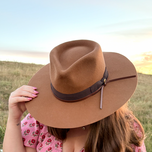 wide brim wool hat, western felt hat, boho chic hat, fall winter hat, stiff brim hat, triangle crown hat, custom band hat, cowgirl style hat, boutique wool hat, concert hat, game day hat, bohemian western hat, neutral wool hat, trendy fall accessories, statement hat for women, boho fall fashion, rancher hat, holiday outfit accessory, elevated everyday hat