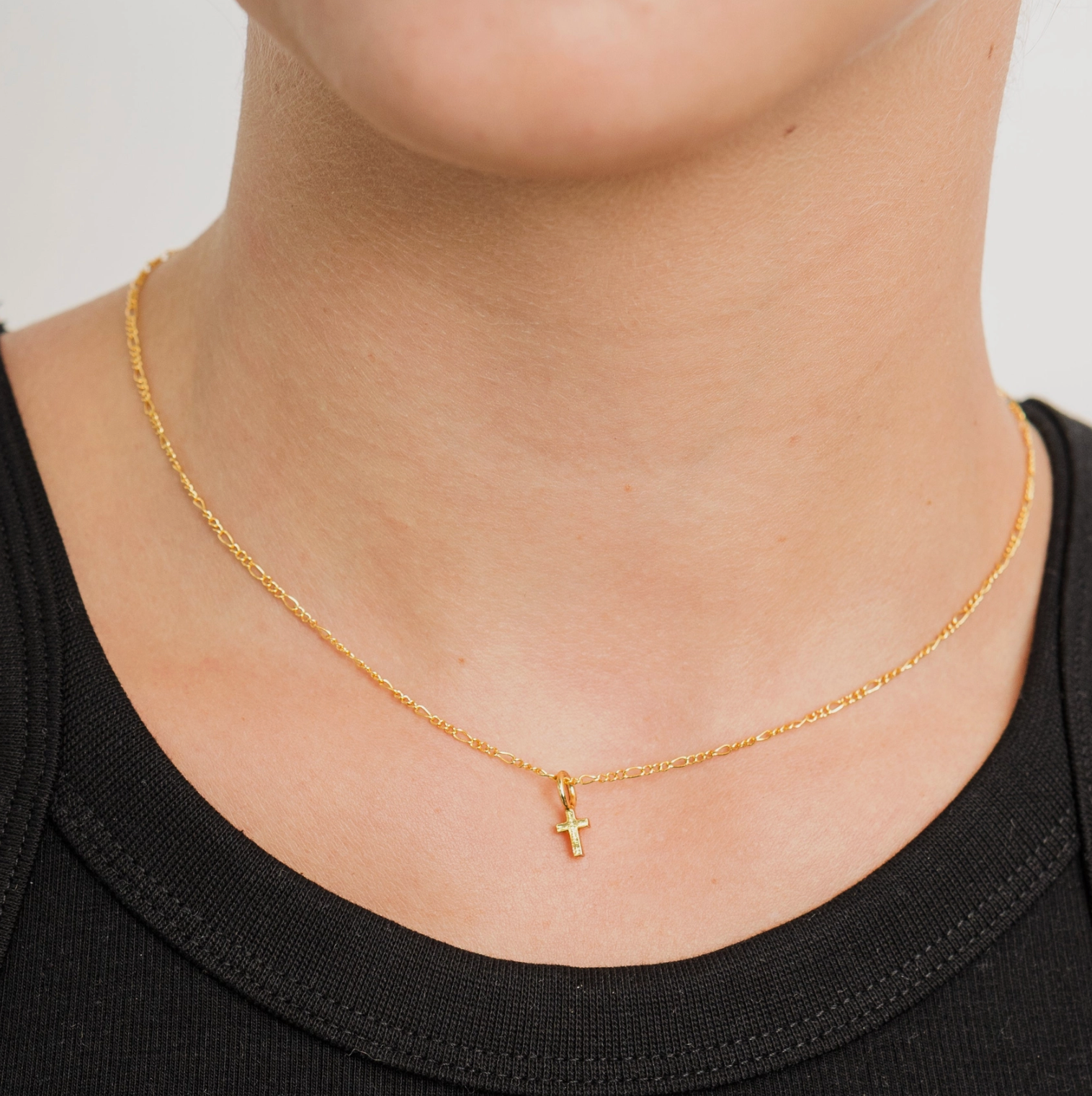 gold cross necklace, faith necklace, everyday cross necklace, minimalist cross jewelry, christian jewelry, religious necklace for women, layered cross necklace, dainty gold cross necklace, timeless faith jewelry, meaningful gift necklace, water resistant gold necklace, hypoallergenic jewelry, nickel free necklace, 24k gold plated necklace, brass gold necklace, adjustable gold necklace, criss cross chain necklace, faith based jewelry gift, christian gift for women, confirmation gift necklace