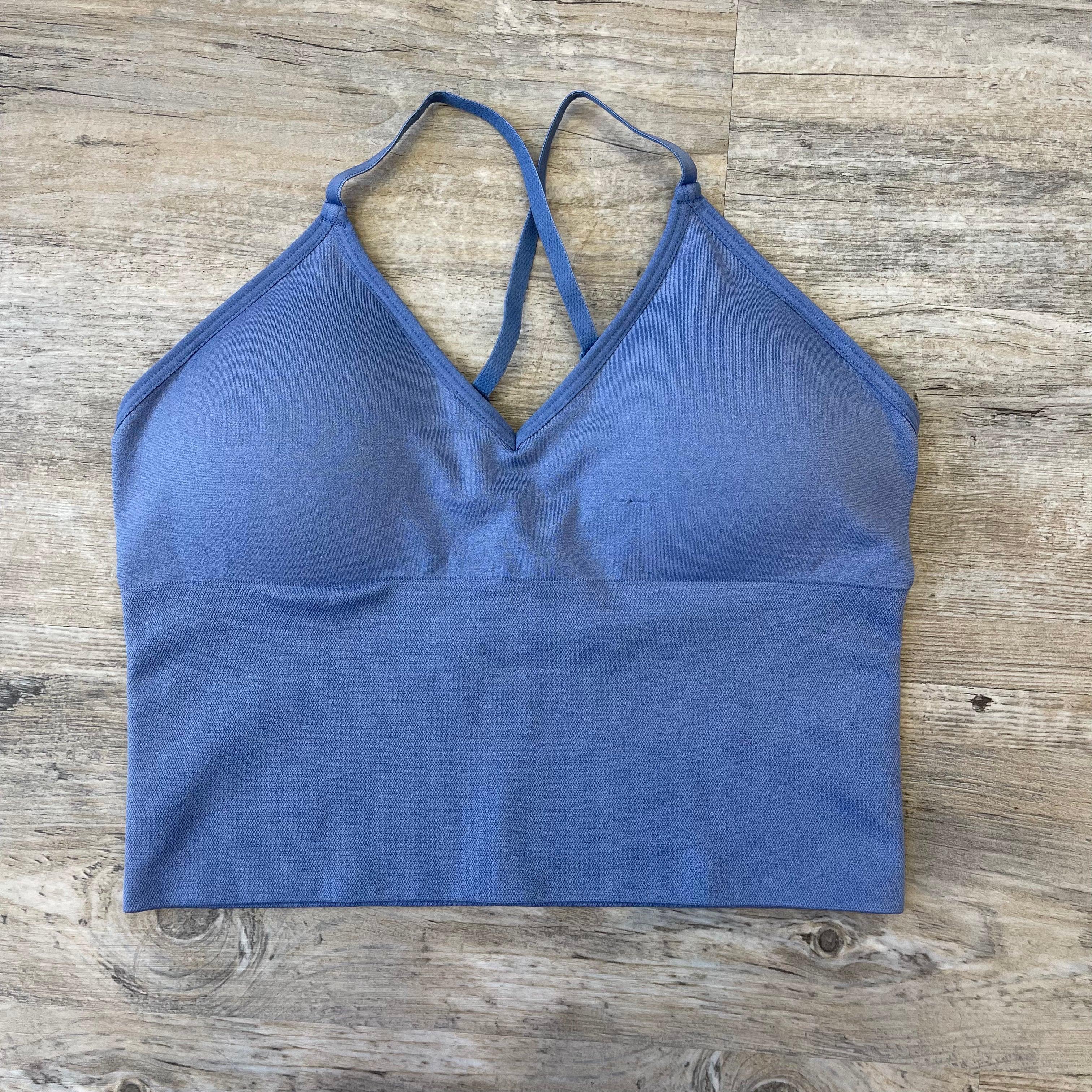 adjustable bralette, cross back bralette, elastic bralette, removable pad bralette, comfortable bralette, everyday bralette, solid color bralette, athleisure bralette, seamless bralette, layering bralette, sporty bralette, casual bralette, adjustable strap bra top, stretchy bralette, soft bralette, supportive bralette, women’s lounge bralette, activewear bralette, yoga bralette, S/M L/XL bralette, boutique bralette, comfy bra alternative, fitness bralette, cute bralette for layering